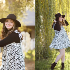 High school senior girl smiling with a hat with willow tree background in Bywater Hollow Lavender Farm