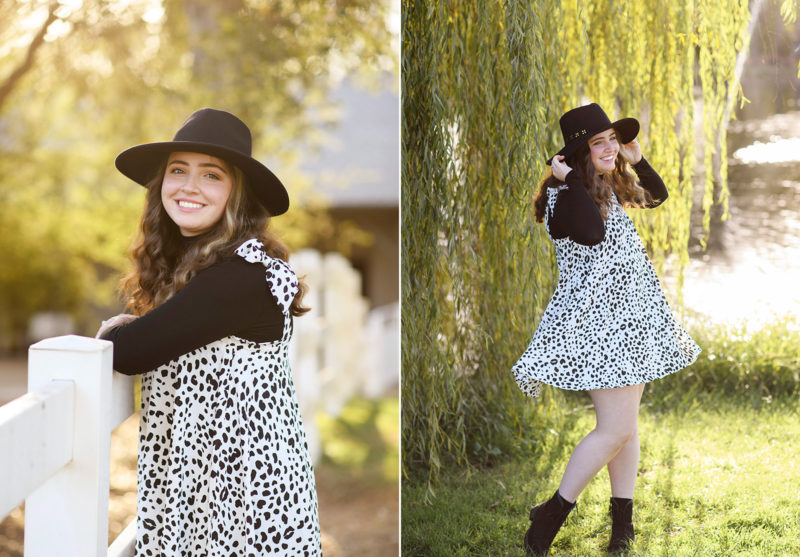 High school senior girl smiling with a hat with willow tree background in Bywater Hollow Lavender Farm