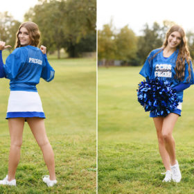 High school senior girl wearing varsity jacket and cheerleading uniform in Sacramento park