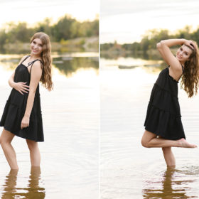High school senior girl wading in lake water and smiling in Sacramento