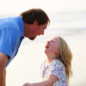 dad and daughter laughing by the ocean dillon beach california