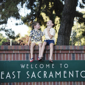 brothers laughing with sign east sacramento california