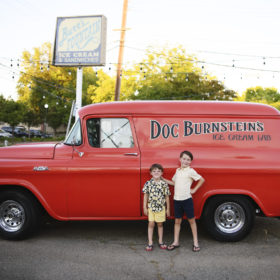 two young brothers in front of red ice cream van east sacramento california