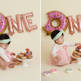 one year old girl pink donut studio cake smash photo shoot tasting sprinkles in sacramento california