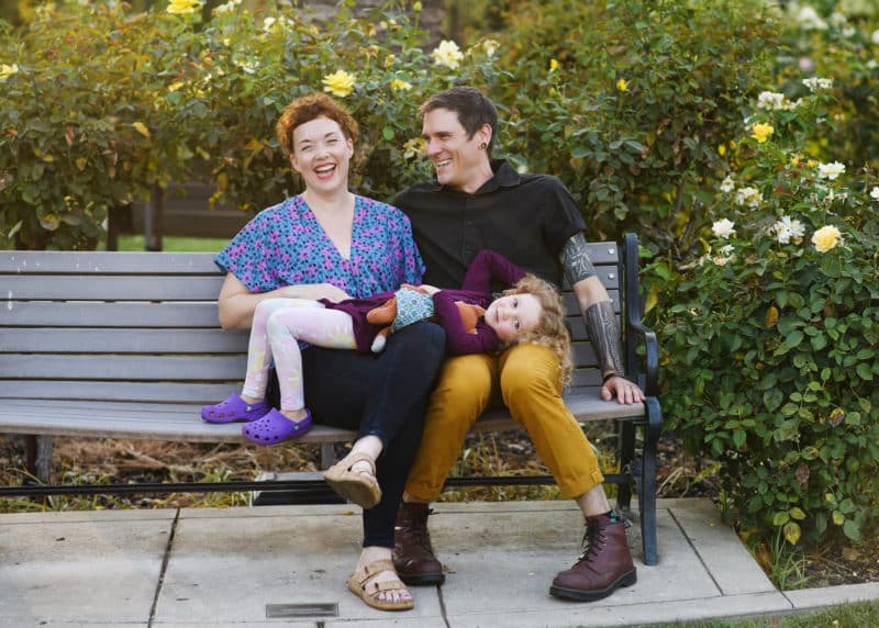 family photo shoot on a bench in the rose garden sacramento california