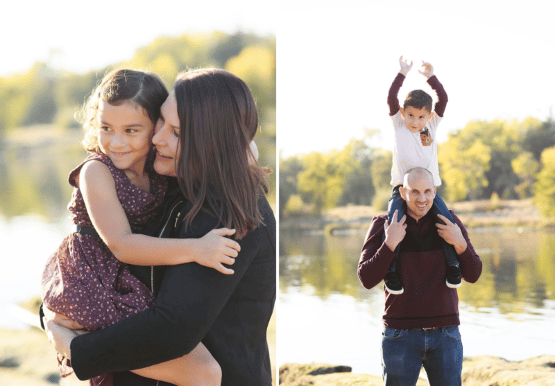 mom and daughter, dad and son standing near the river during fall family photos 