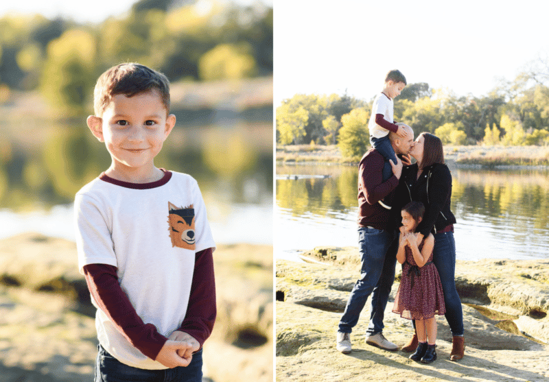 young boy posing by the river, mom and dad kissing during family photos in rancho cordova california