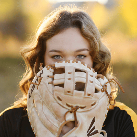 senior girl with softball glove senior photos
