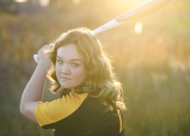 teenage girl senior photos with softball bat rocklin california