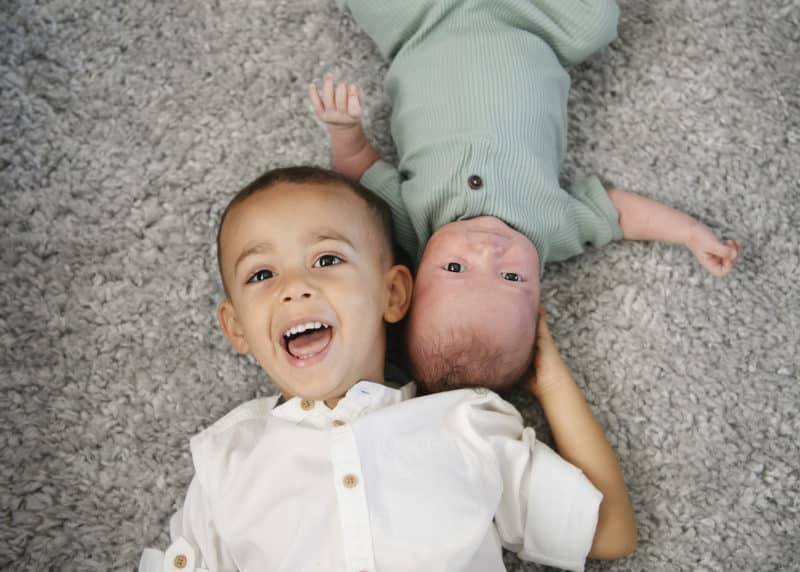 big brother with newborn baby brother at-home newborn session sacramento california