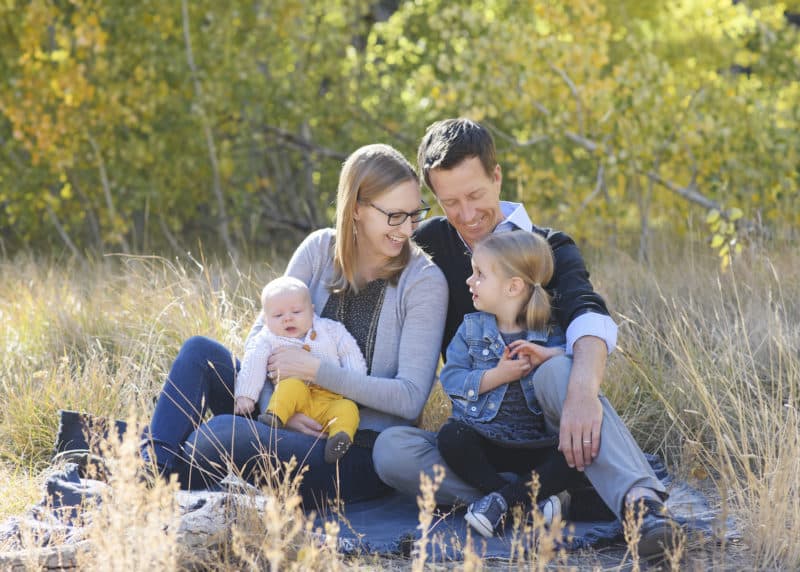 family of four natural pose fall photos in truckee california