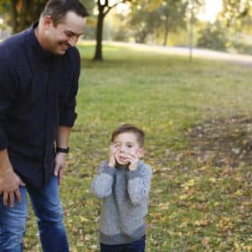 young boy making a funny face with dad in rancho cordova california