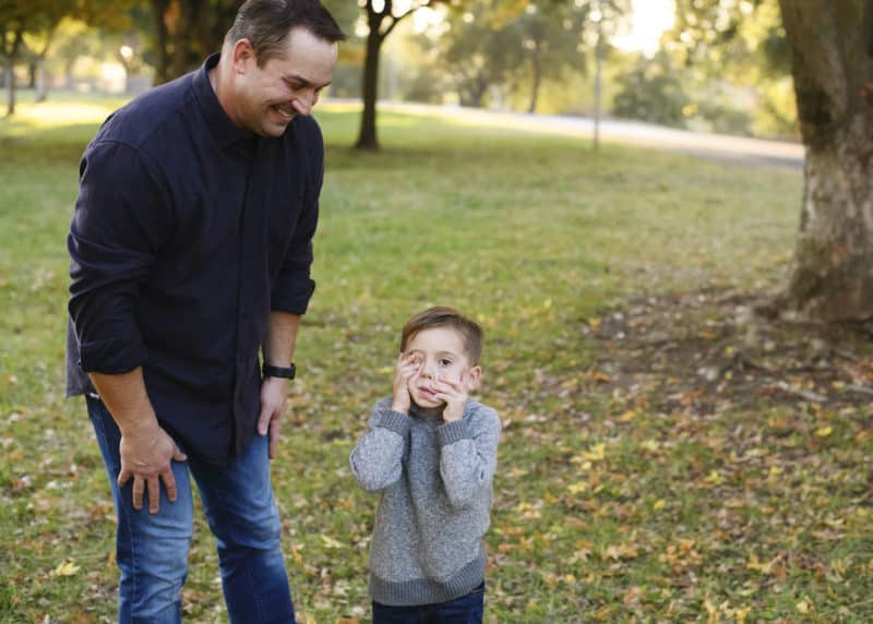 young boy making a funny face with dad in rancho cordova california