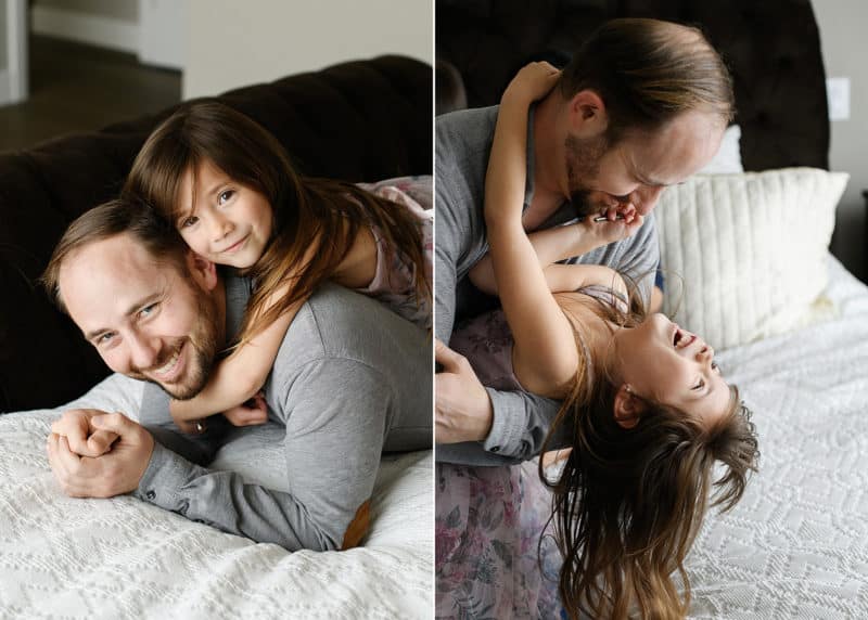 dad with daughter, playing in at home newborn session