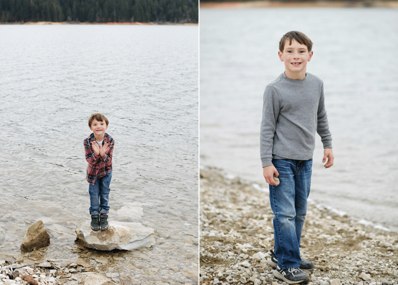 two young brothers posing on the water