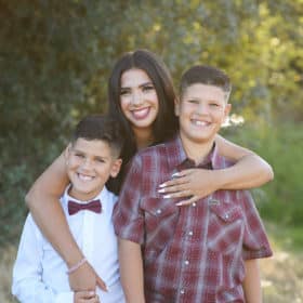 older sister with younger brothers outdoor photo shoot elk grove california