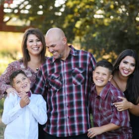 family of five laughing outdoor photo shoot elk grove california