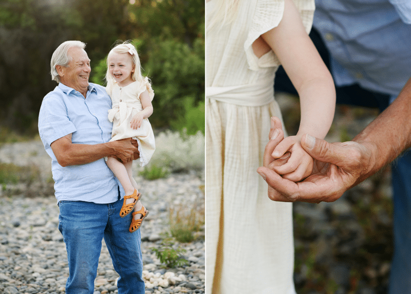 grandpa and granddaughter laughing together, holding hands