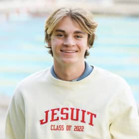 water polo senior graduation portrait at the jesuit high school pool