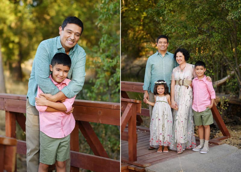 dad hugging son, family of four posing on a bridge in the summer sacramento california