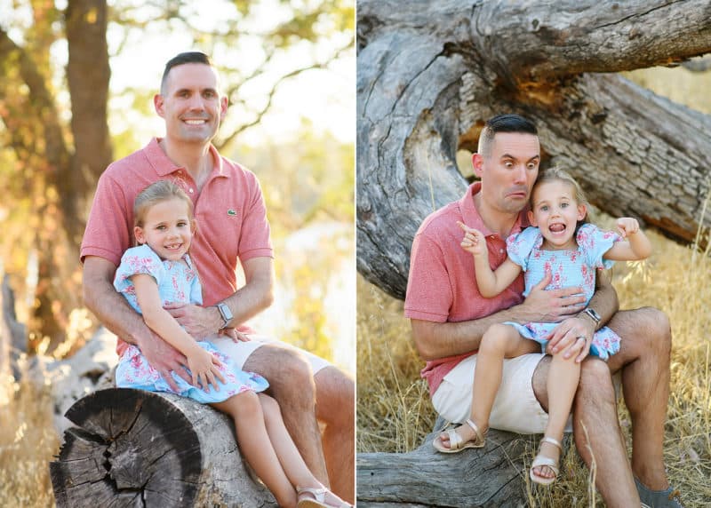 dad and daughter sitting together on a log, making funny faces during family photo session in folsom california