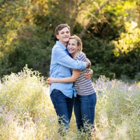 high school senior hugging mom during photo session in folsom california