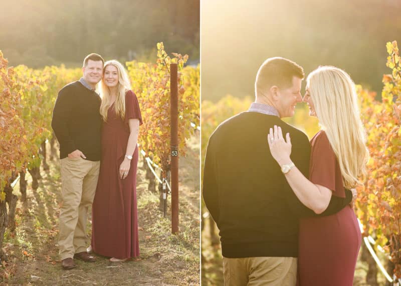couple standing together in the vineyard during fall season in golden hour