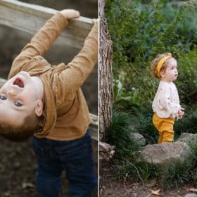 young boy hanging upside down on a wooden fence, toddler girl standing in the middle of a garden