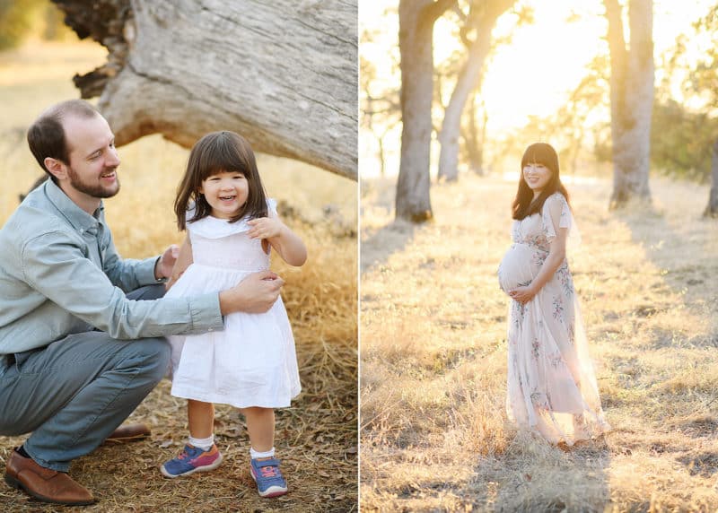dad playing with young daughter during fall photo shoot, pregnant woman holding belly during golden hour