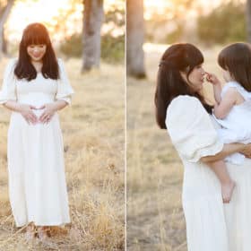 pregnant woman holding belly with heart hands, young daughter poking mom on the nose during family photo session