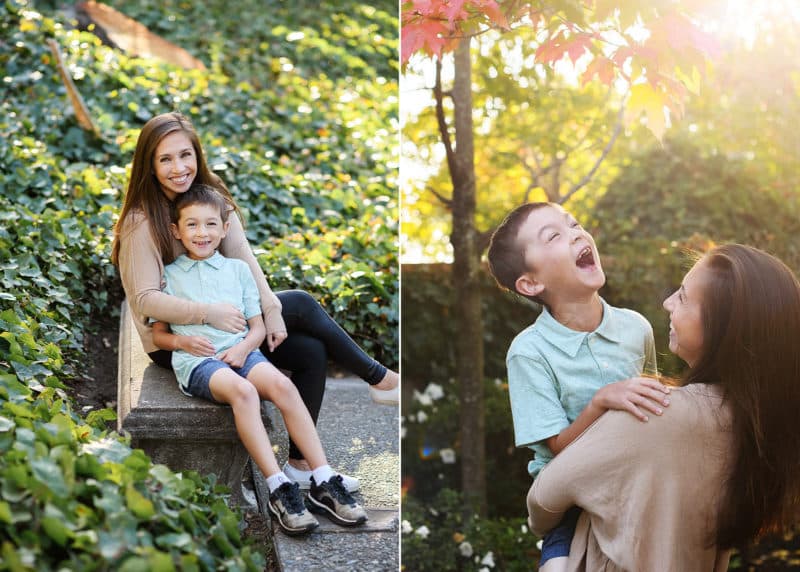 mom and son sitting on a bench in the leaves, mom holding son while he is laughing during golden hour