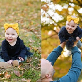baby girl sitting on the grass in fall leaves, dad holding baby up in the air during family photos