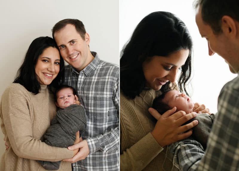 mom and dad holding newborn baby in studio session, mom kissing baby on the head