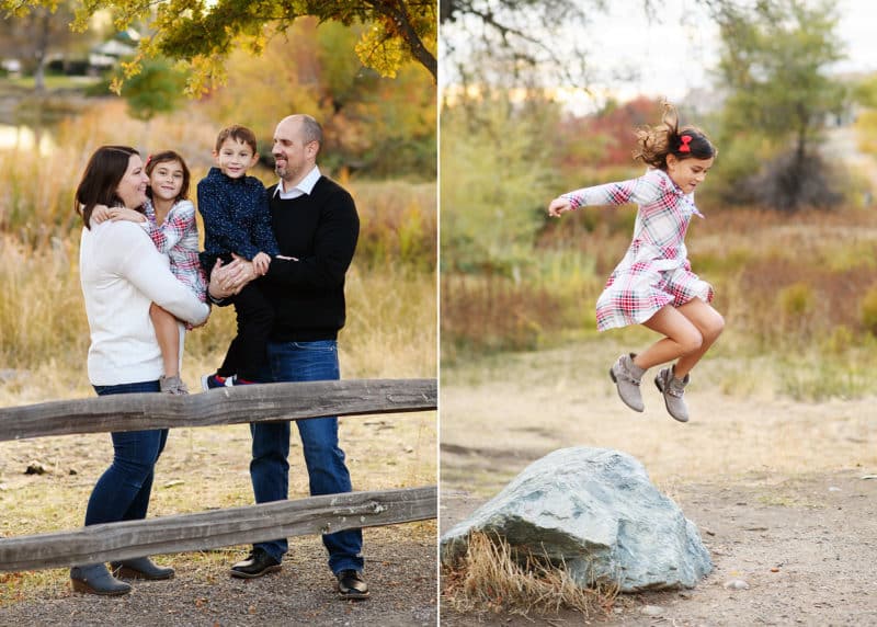 family of four standing by a rickety fence during photo session, young girl jumping off a rock in a field