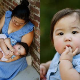 mom holding baby daughter by front door, young girl staring at the camera during family photo session