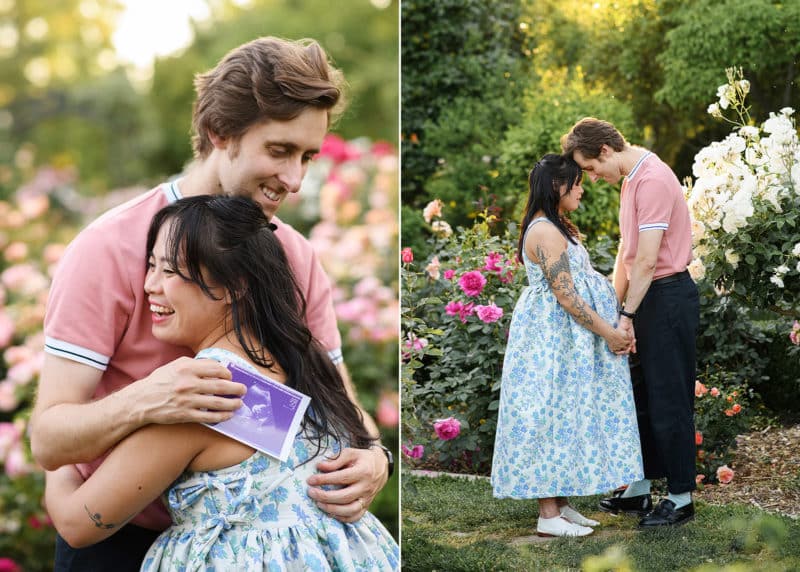 pregnant couple hugging with picture of baby's ultrasound, touching foreheads in the rose garden