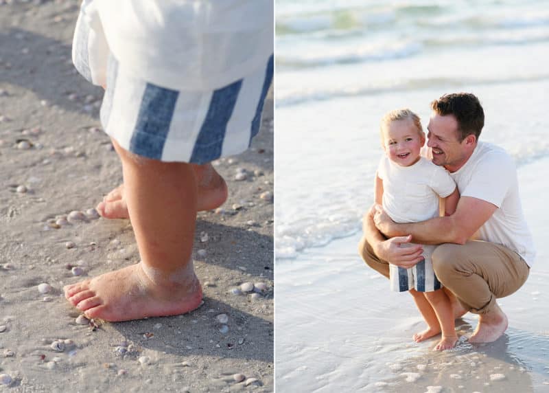 young boy's feet standing on the sand on a florida beach, father and son looking at the water