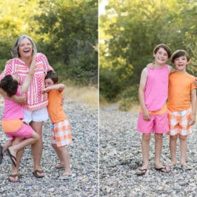 mom with two sons laughing outside, brothers hugging and smiling for the camera at folsom lake