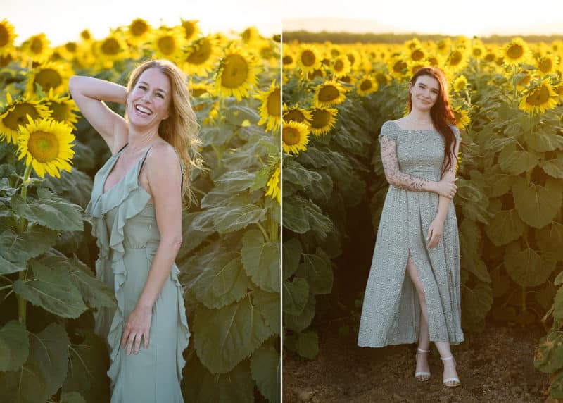 mom looking at the photographer standing in a field of sunflowers, daughter posing in a green dress in dixon california