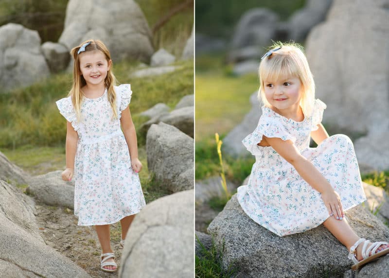 young girls wearing white floral dresses while taking family photographs in granite bay california