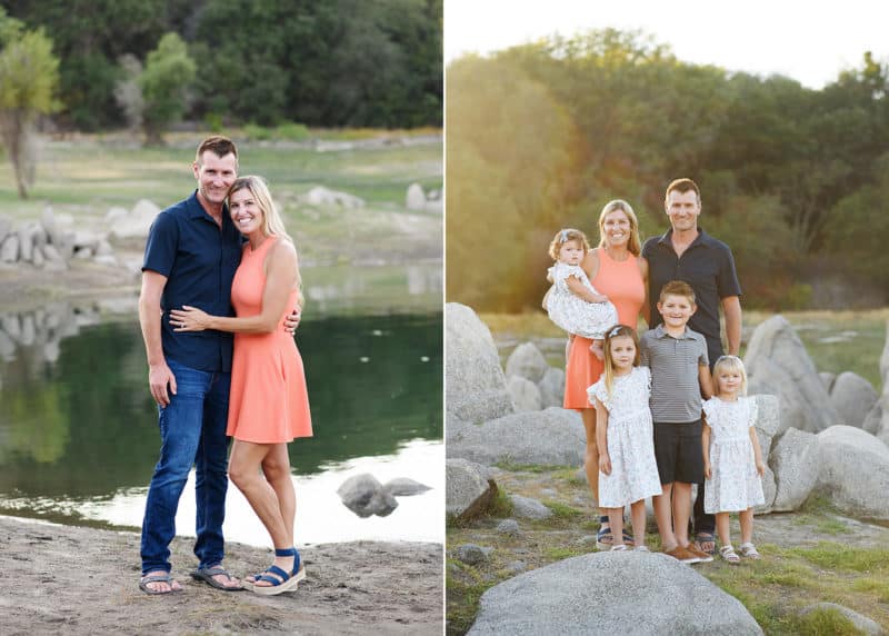 family of six posing together looking at the family photographer, mom and dad hugging in front of a lake in granite bay california