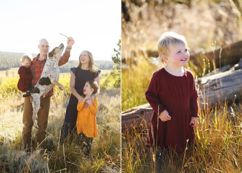 family dog jumping in front of photographer during family photos, young girl looking up at her parents