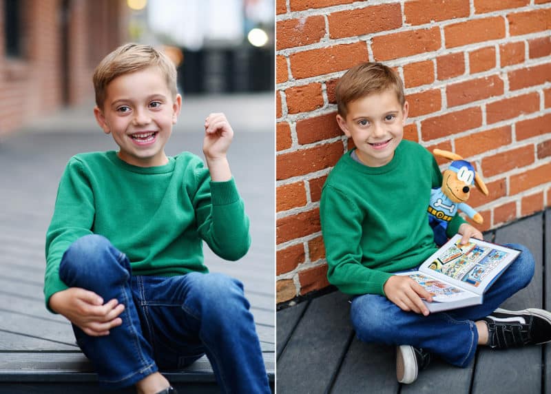 young boy reading "dog man" series while photographer takes pictures and laughs in downtown sacramento california